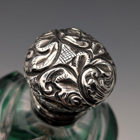 Antique British silver-lidded green cut glass portable perfume bottle